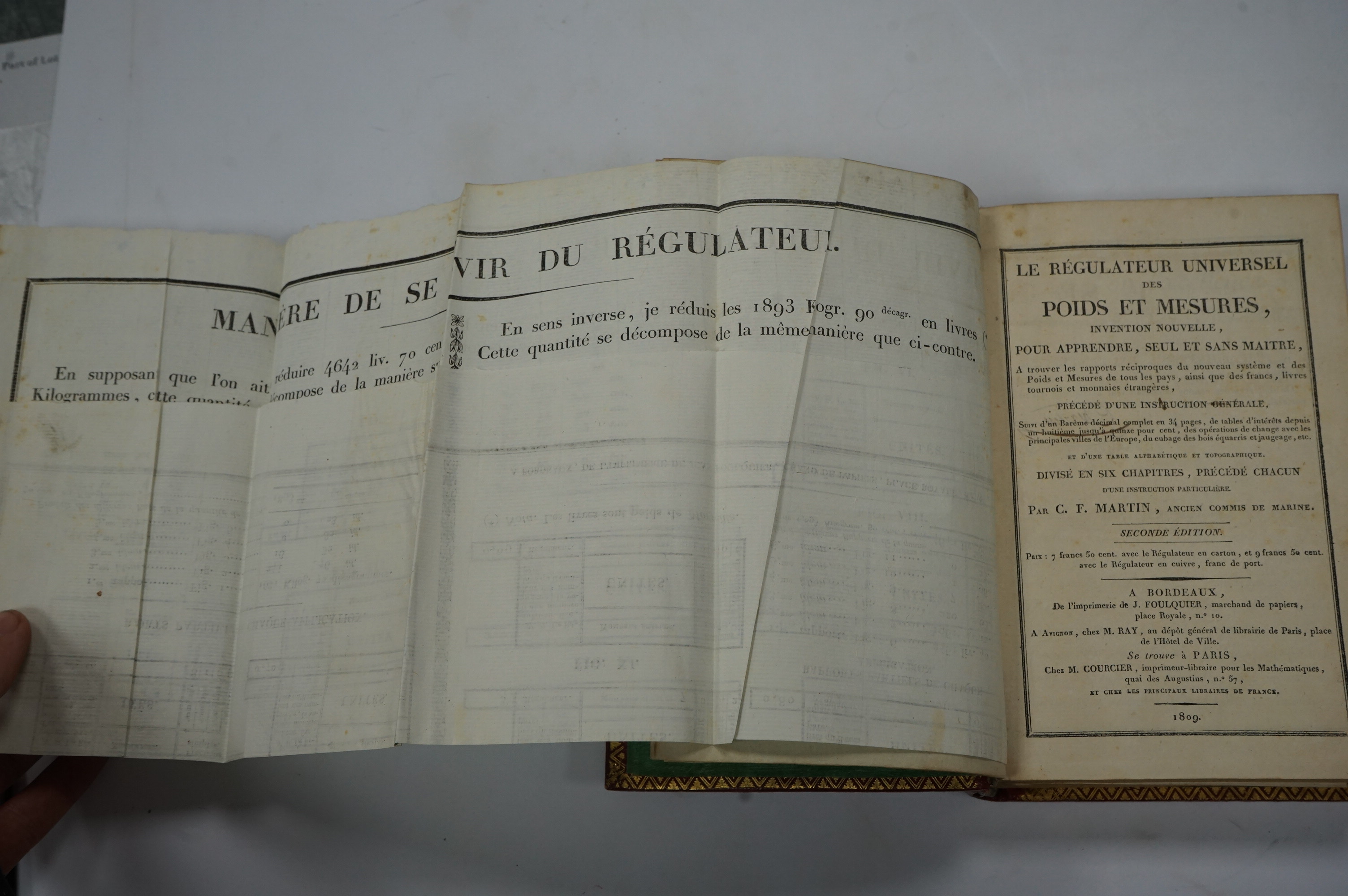 Martin, C. Francois - Le Régulateur Universel des Poids et Mesures, invention nouvelle, 8vo, 533pp, errata, with three folding printed tables, one bound as frontispiece, and two (card and silver plate) regulateurs preser